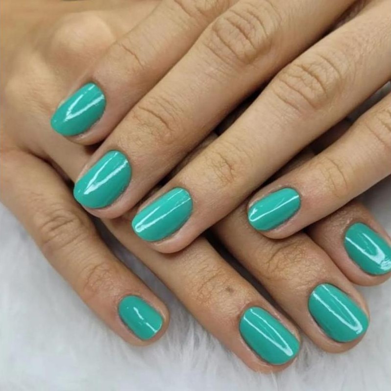 Esmaltação em gel verde-água brilhante